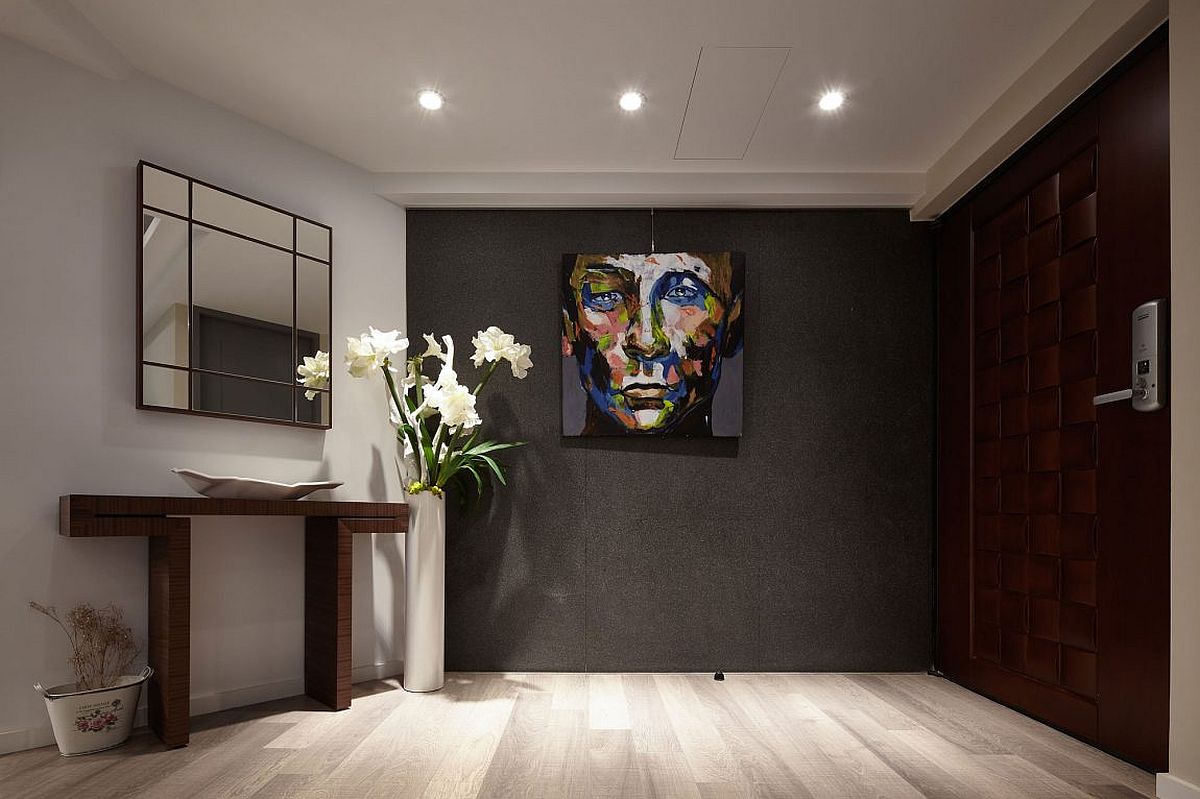 Dark and dashing entry of the renovated apartment in Taipei