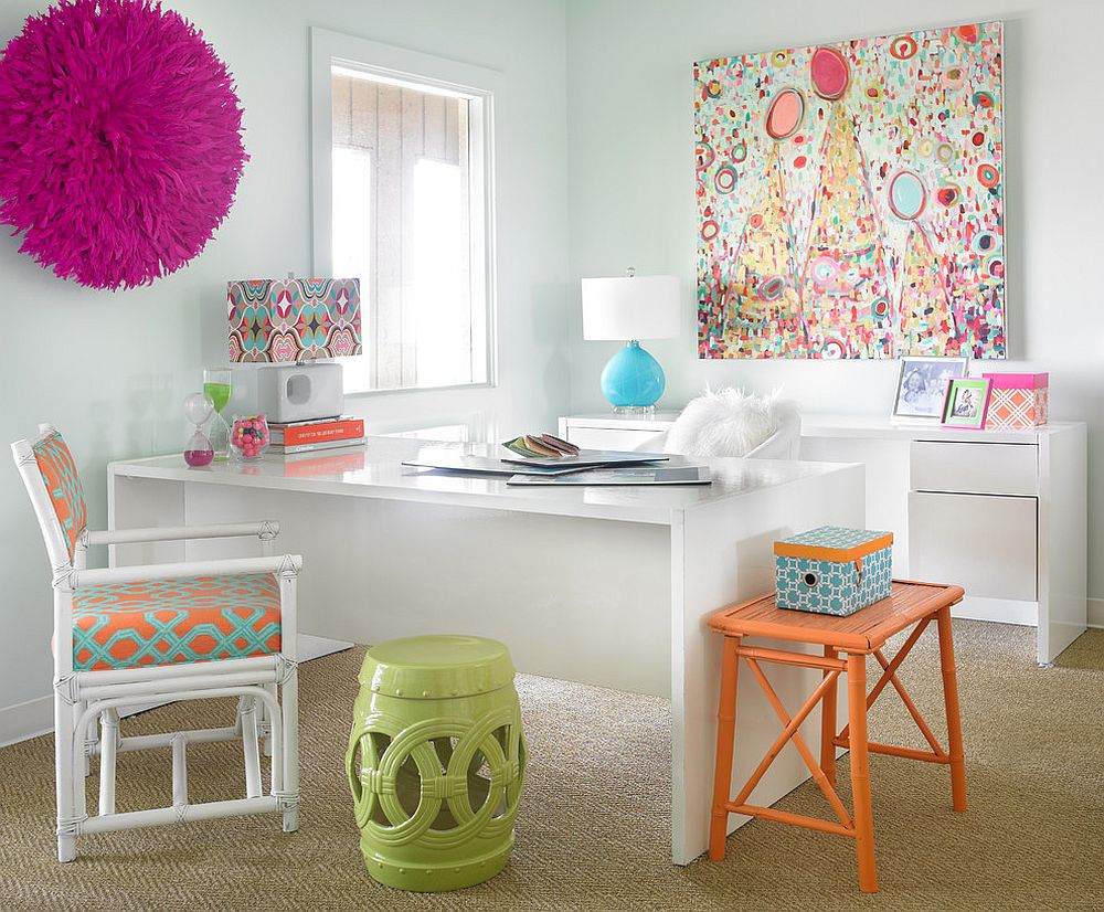 Decor and wall art adds color to the white home office