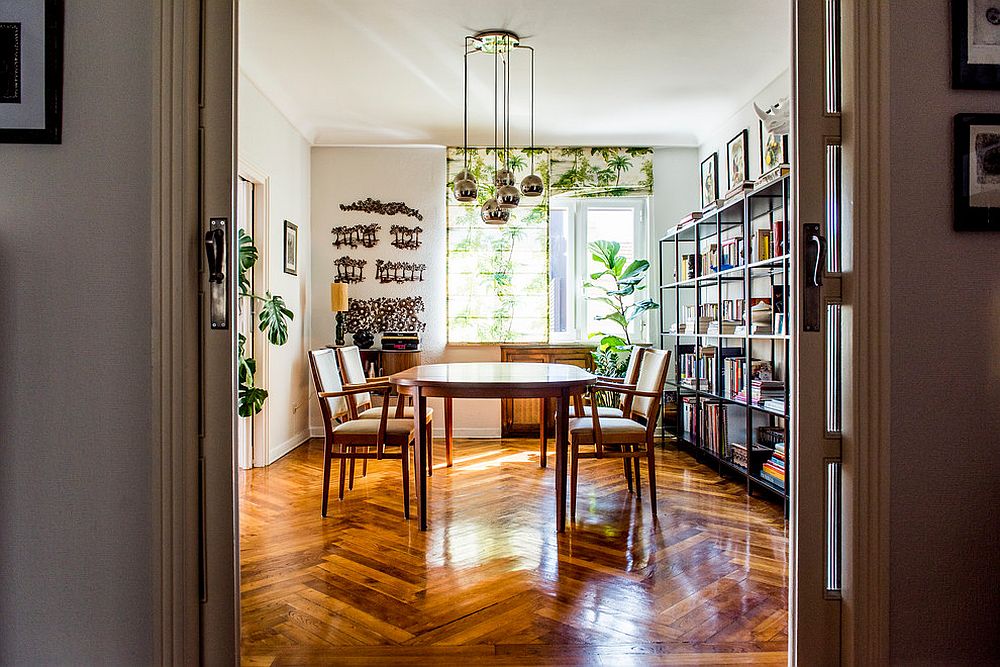 Dining room shades also add a touch of greenery to the dining room