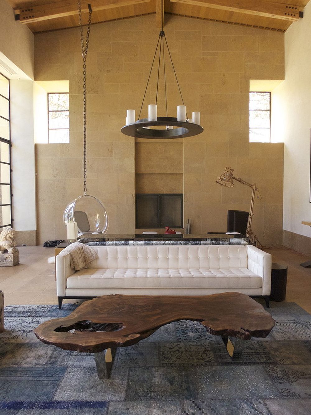 Eclectic living room with custom live edge coffee table [Design: Urbanspace Interiors]