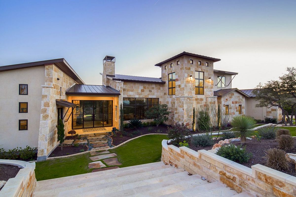 Entryway and stone walkway leading to the luxurious Texas home