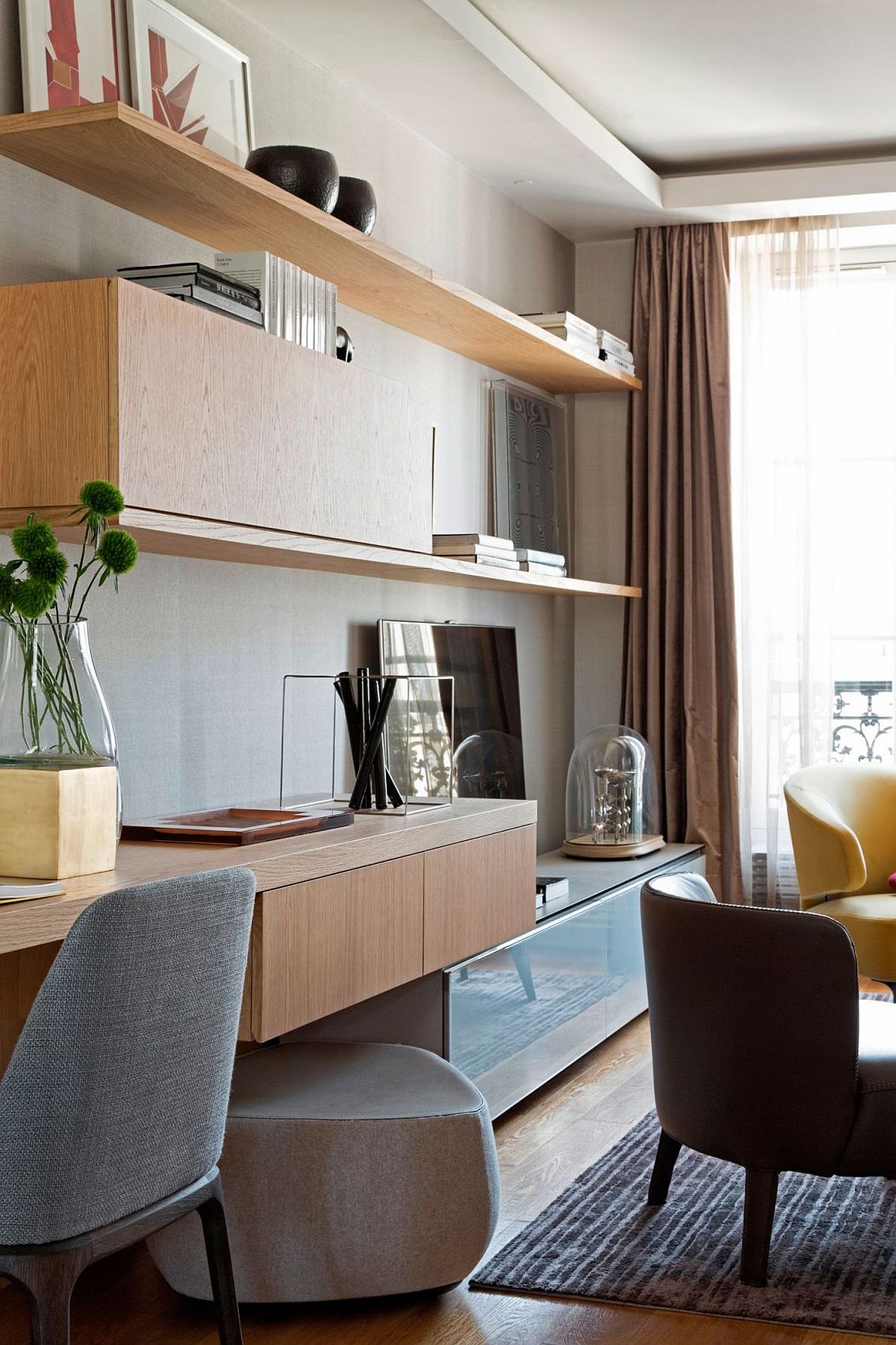 Floating wooden shelves and cabinets for the living room media wall