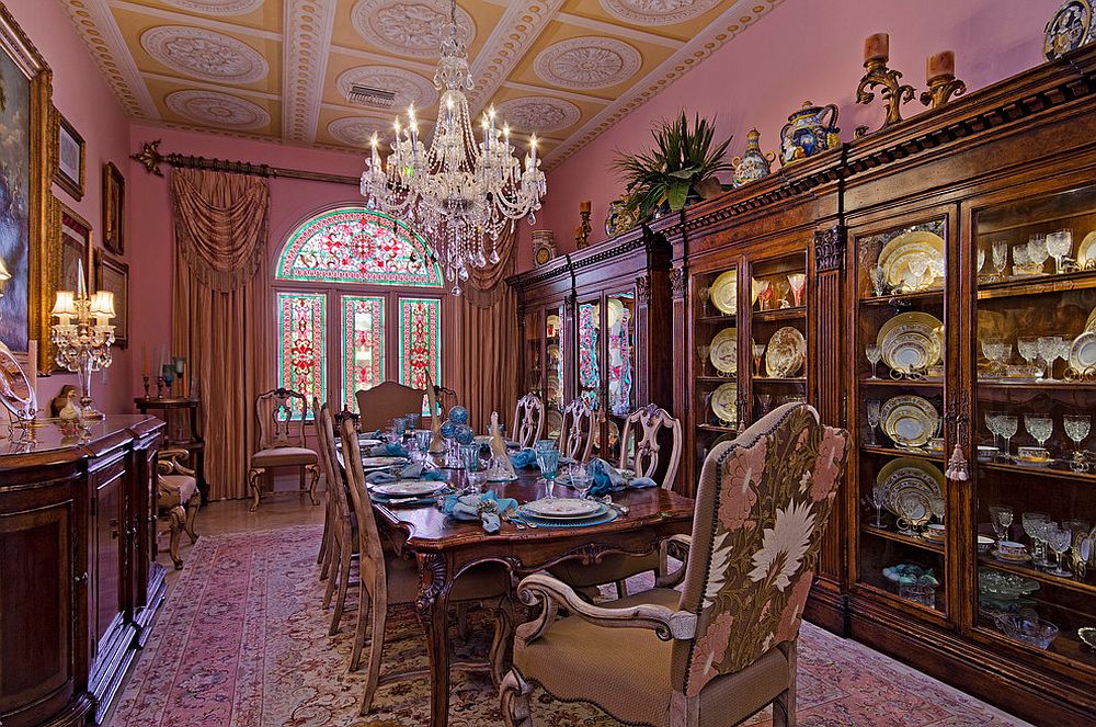 From ceiling medallions to gold accents everything about this dining room shouts out Victorian [Design: Certified Luxury Builders – Sarasota]