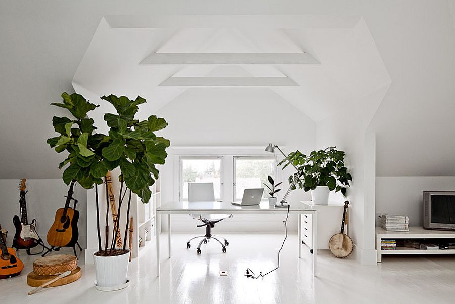 Gorgeous attic home office in white with indoor plants and plenty of freshness