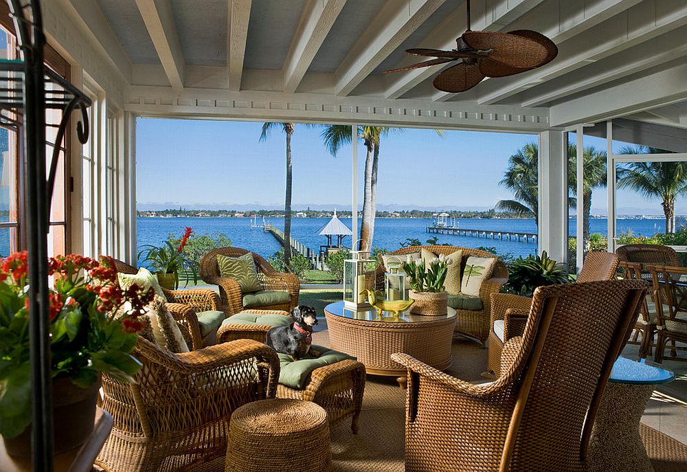 Gorgeous ceiling fan is an essential part of the tropical sunroom [Design: Dianne Davant and Associates]