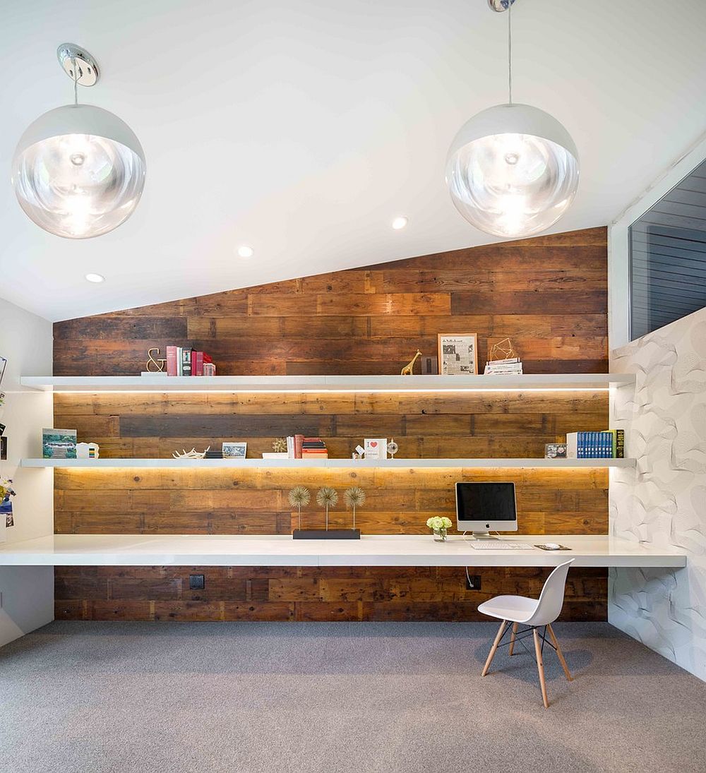 Gorgeously lit shelves and reclaimed wood wall create a stunning midcentury modern home office [From: Vanillawood]