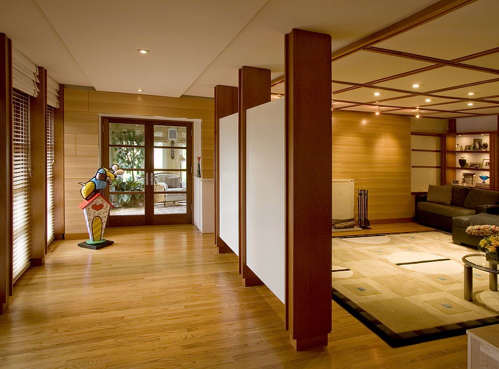 Hallway separated from the media room using simple screens [Design: Stone+Glidden]