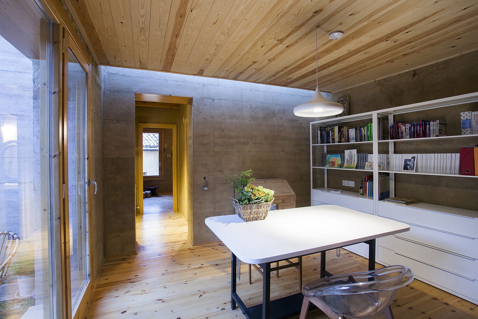 Home office with glass doors and a natural vibe