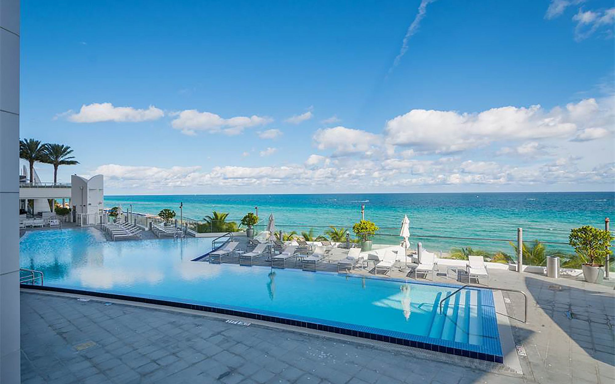 Infinity edge beach and ocean views at the Jade Beach luxury condo in South Florida