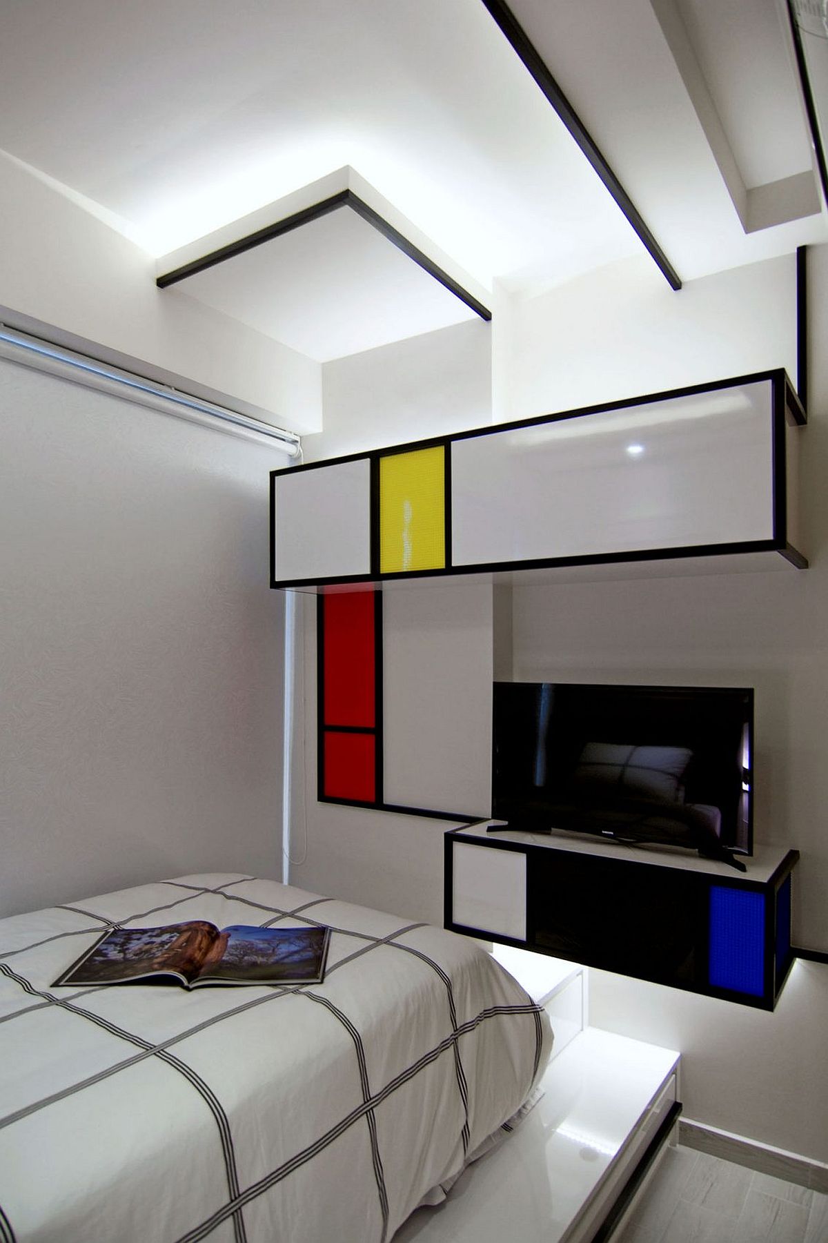 Influence of De Stijl art movement makes its presence felt inside this bedroom