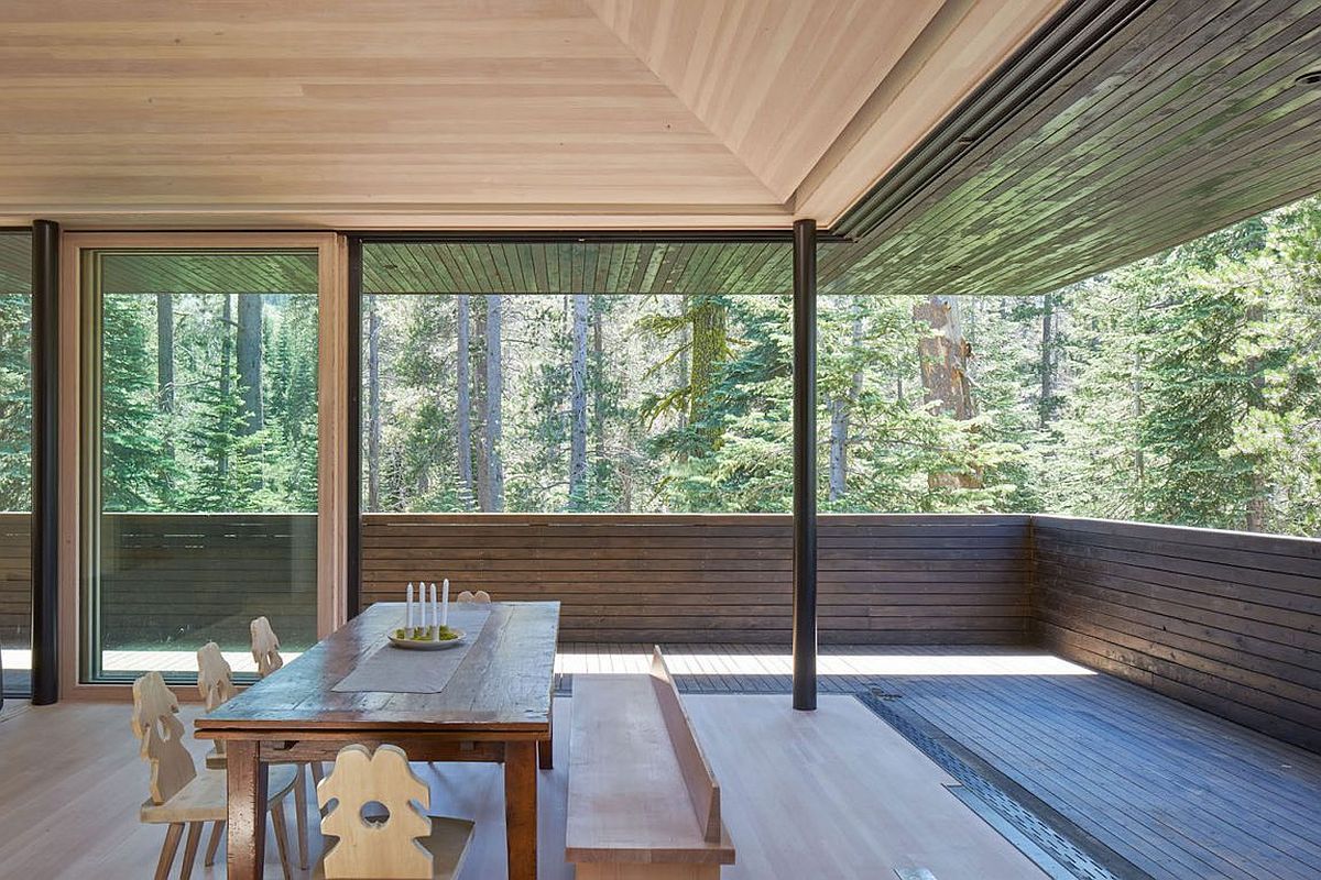 Large sliding glass doors blur the lines between the outdoors and the interior
