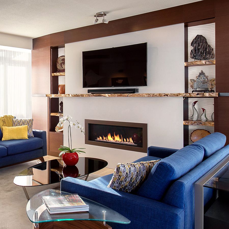 Live edge shelves and mantle transform this contemporary living room