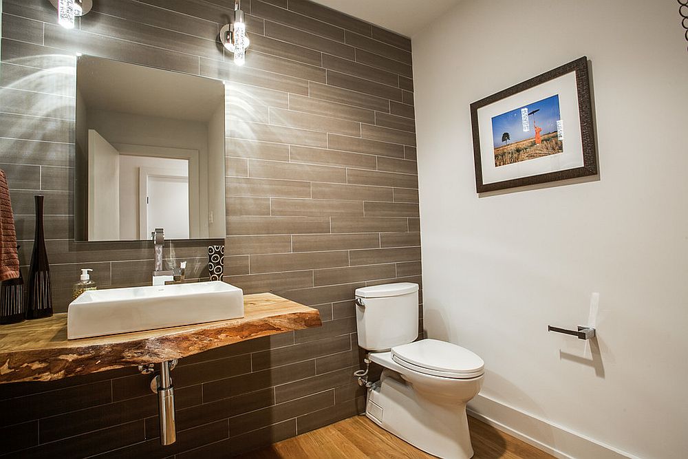 Live edge vanity for the modern powder room with gray tiled wall