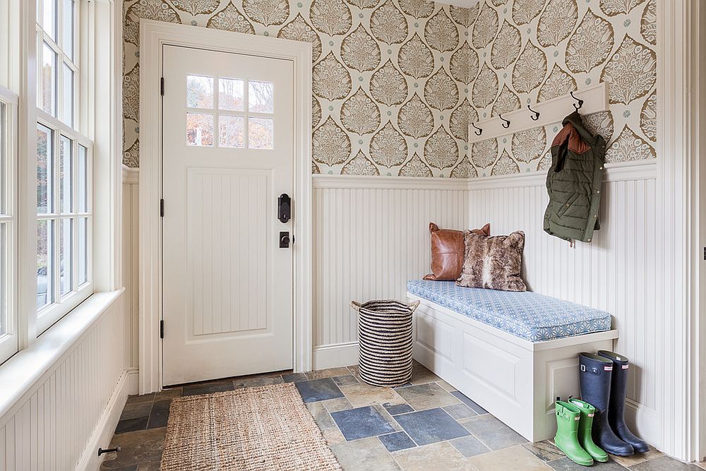 Lotus wallpaper adds interesting and unique motif to the small entrance hall [From: Greg Perko Photography]