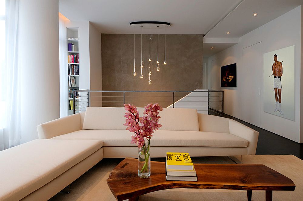 Lovely live edge coffee table stands out instantly in the modern living room [From: West Chin Architects & Interior Designers / Ken Fischer Photography]