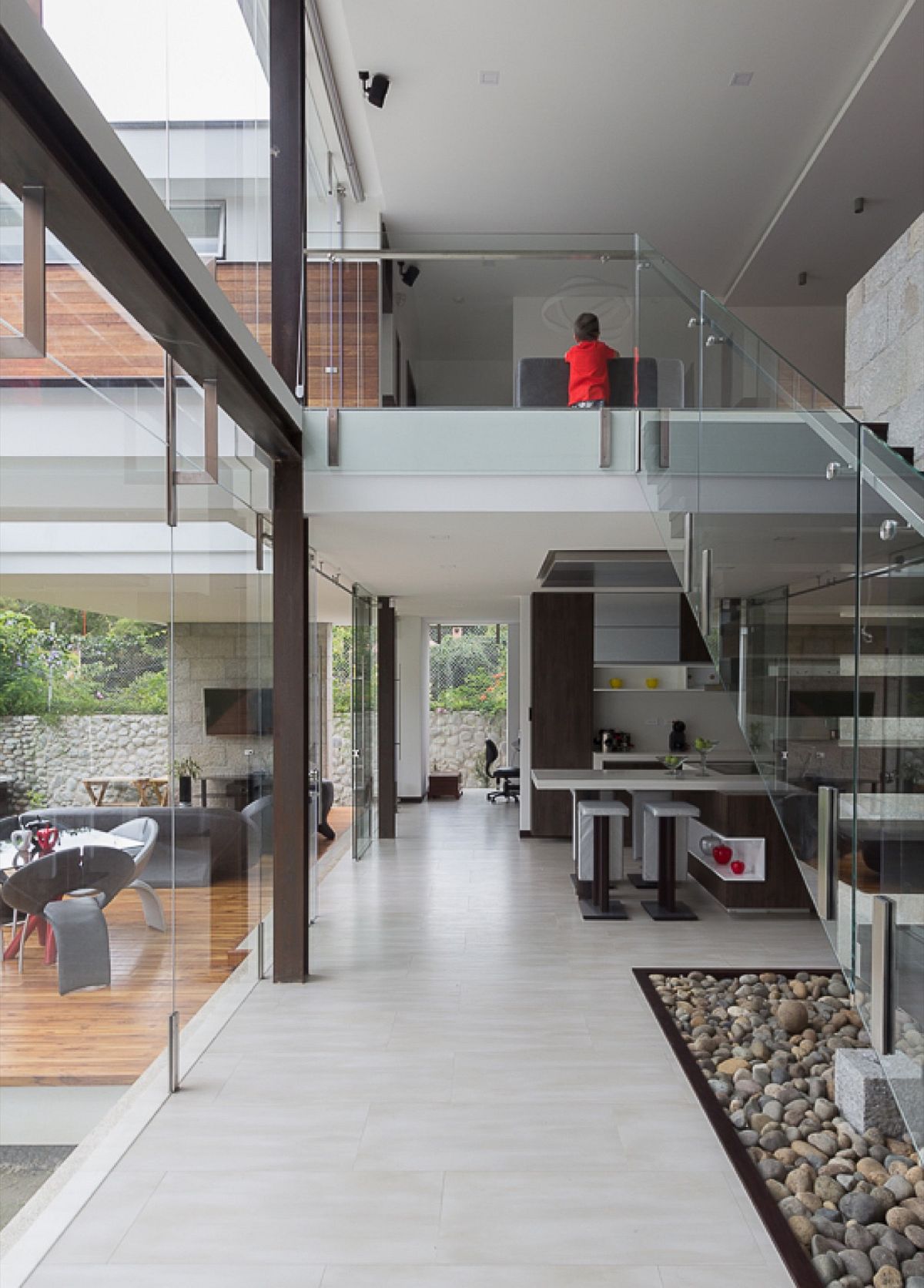 Lower level living area of House PY connected with the wooden deck outside