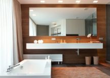 Luxurious-modren-bathroom-with-a-wooden-vanity-wall-217x155