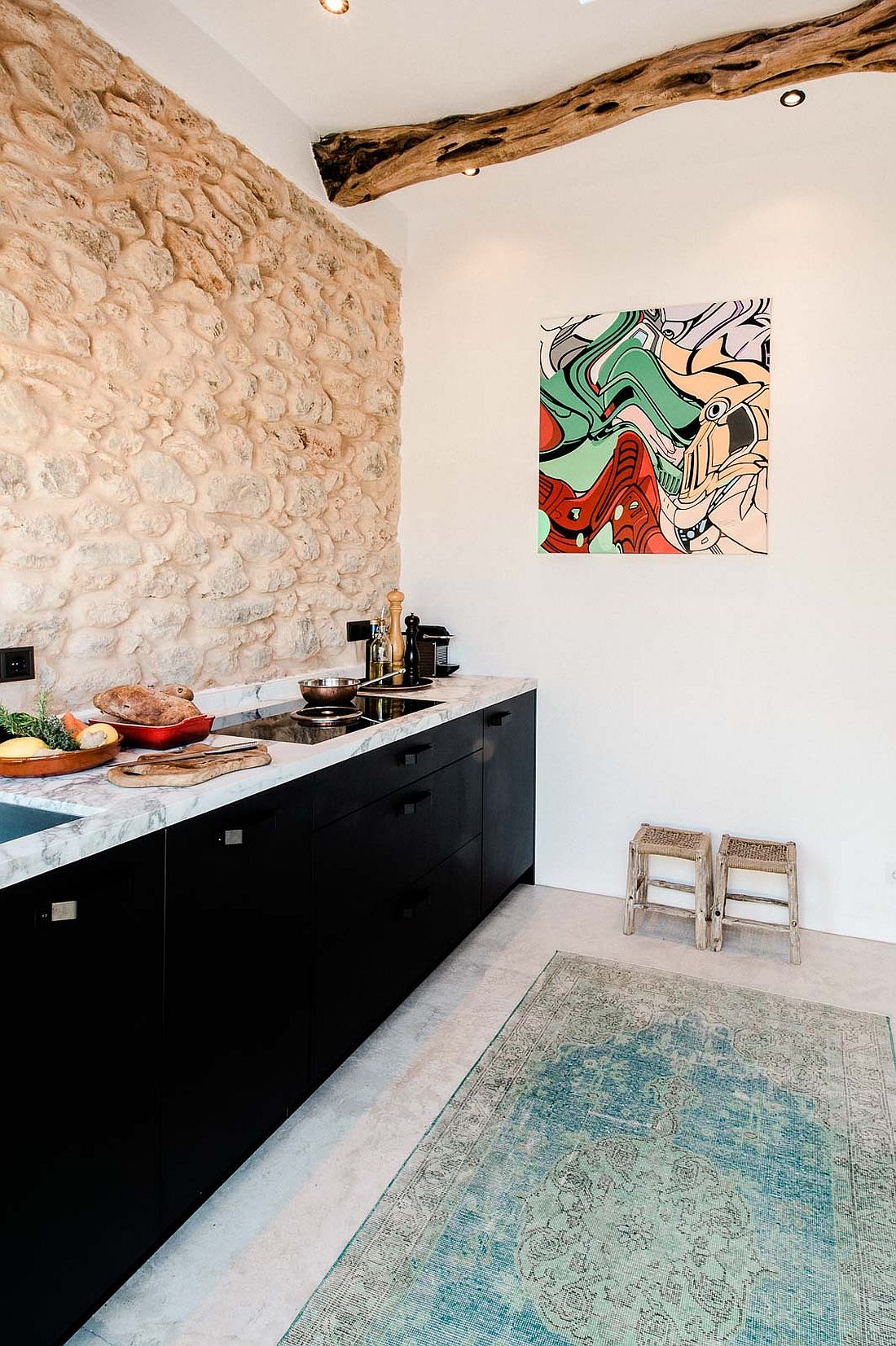 Modern kitchen workstation in black with marble countertop