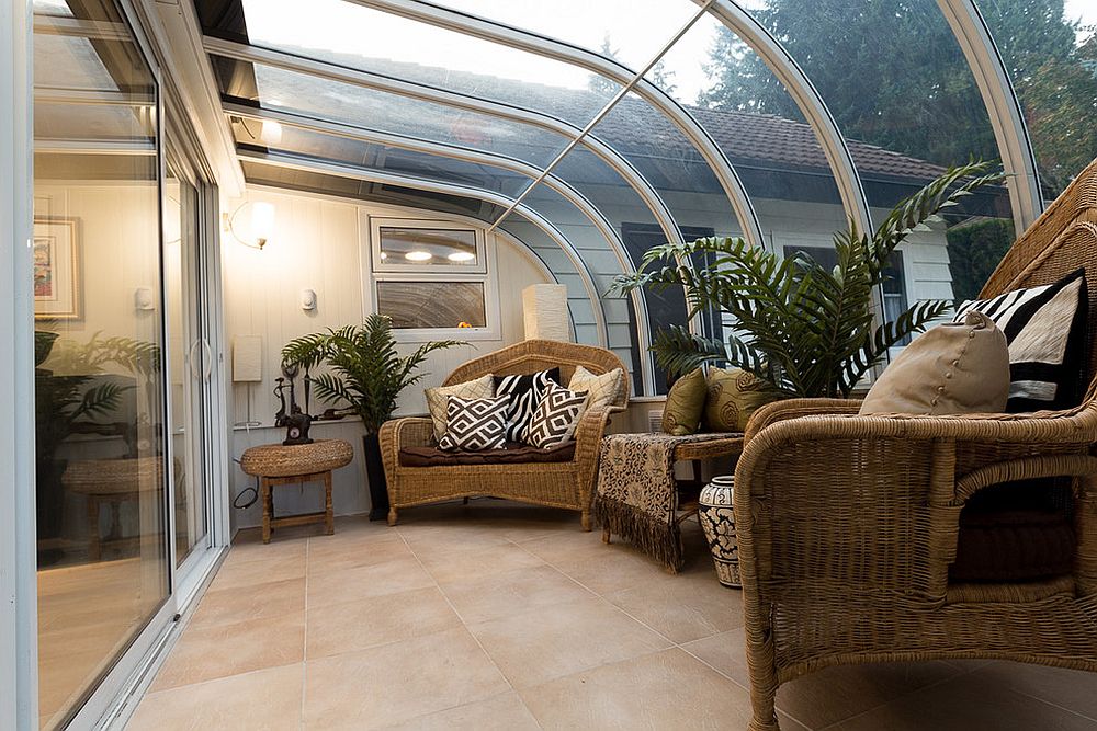 Modern tropical sunroom that borrows from the glassy style of a conservatory [Design: Kalu Interiors]