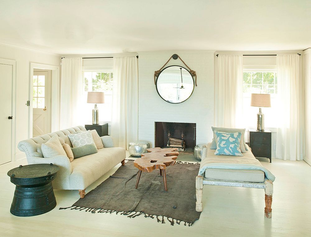 Natural live edge coffee table becomes the heart of this stylish modern living room