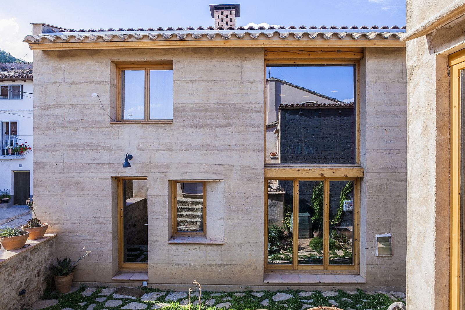 Natural materials combined with modern design at the 21st Century Vernacular Home