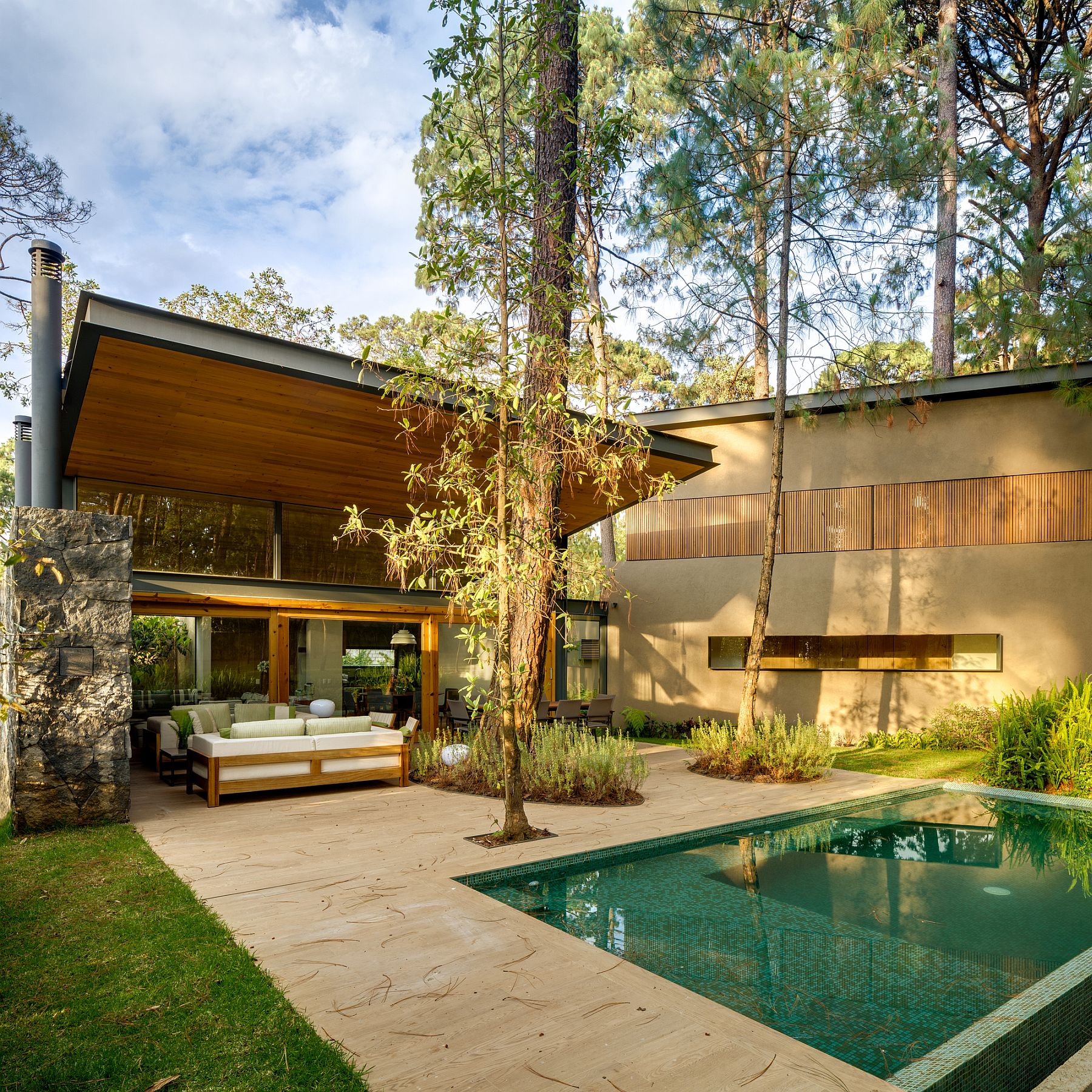 Outdoor pool and Jacuzzi add luxury to the nature-centric homes