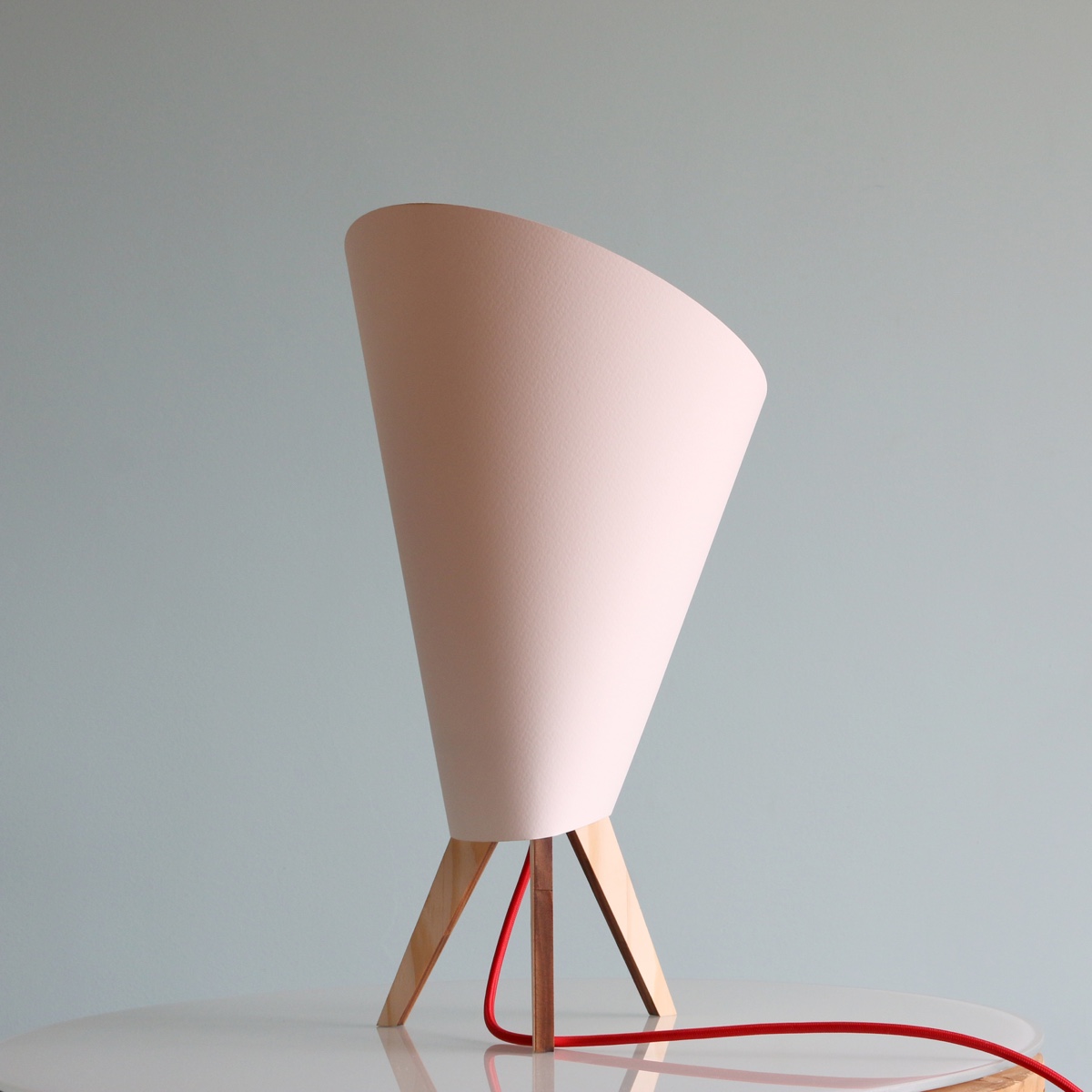 The Plamp Z desk lamp by Bolei comprises a 100% cotton paper shade and a pine wood base from reforested trees.