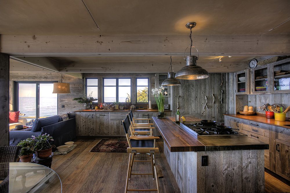 Reclaimed teak brings class and durability to this beach style kitchen [Design: Simmons and Company]