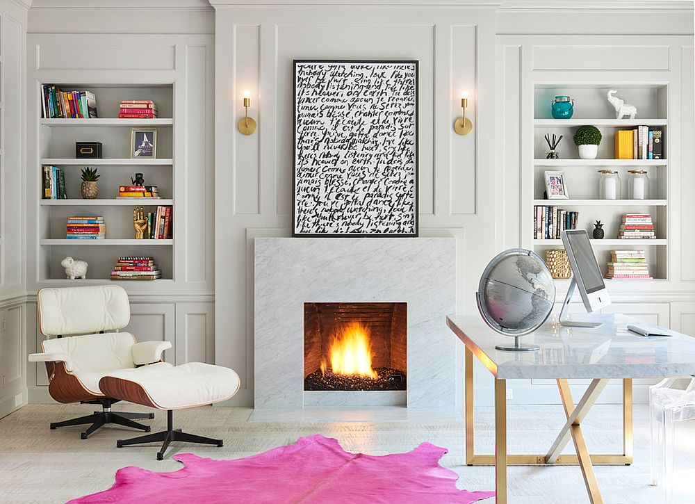 Relaxing contemporary home office in white with a fireplace, Eames Lounger and colorful rug