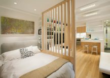 Room-divider-separates-the-bedroom-from-the-living-area-in-this-New-York-micro-apartment-217x155