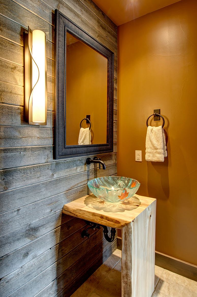 Rustic powder room with reclaimed wood accent wall and orange wall in matte finish [From: Jon Eady Photographer]