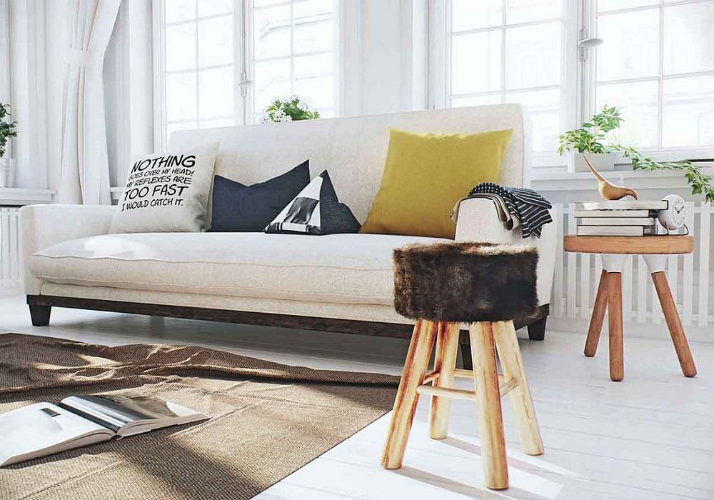 Simple stools used as side tables in the Scandinavian living space