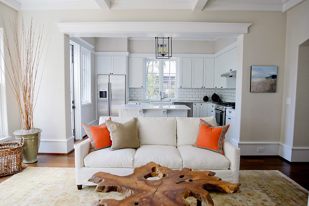 Slice from a tree trunk turned into a cool coffee table [Design: Margaret Donaldson Interiors]