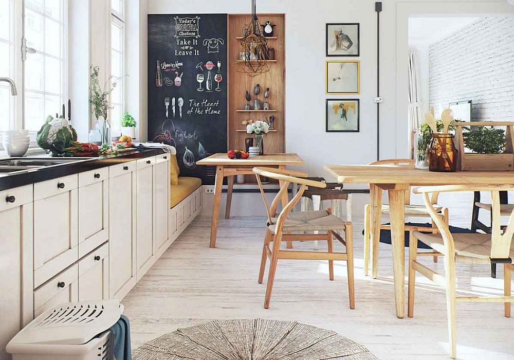 Sliding door clad in chalkboard paint next to the small sitting nook in the kitchen