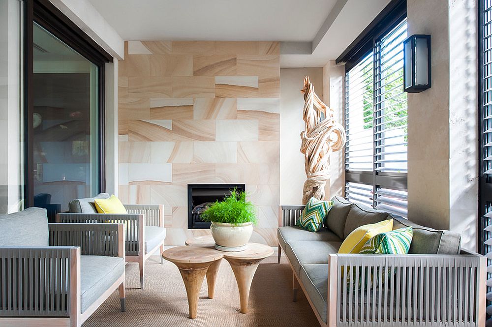 Small and breezy sunroom with modern tropical style [Design: Alexander Pollock Interiors]