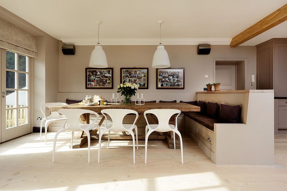 Spacious and cheerful Scandinavian dining room with a large banquette [From: Sola Kitchens]