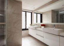 Spacious-bathroom-with-large-floating-vanity-in-white-217x155