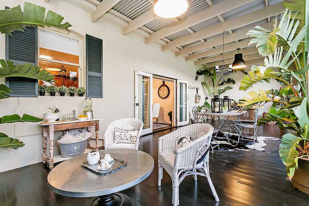 Spacious sunroom with dining space and relaxing lounge