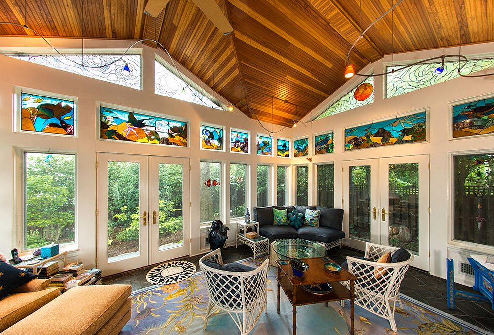 Stained glass and ingenious rug bring tropical vibe to the sunroom [Design: Howard Katz Architects]