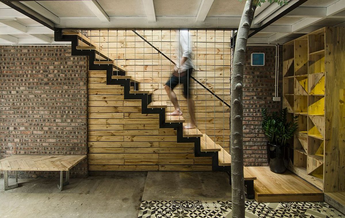 Staircase leading to the top level of the A's House in Vietnam