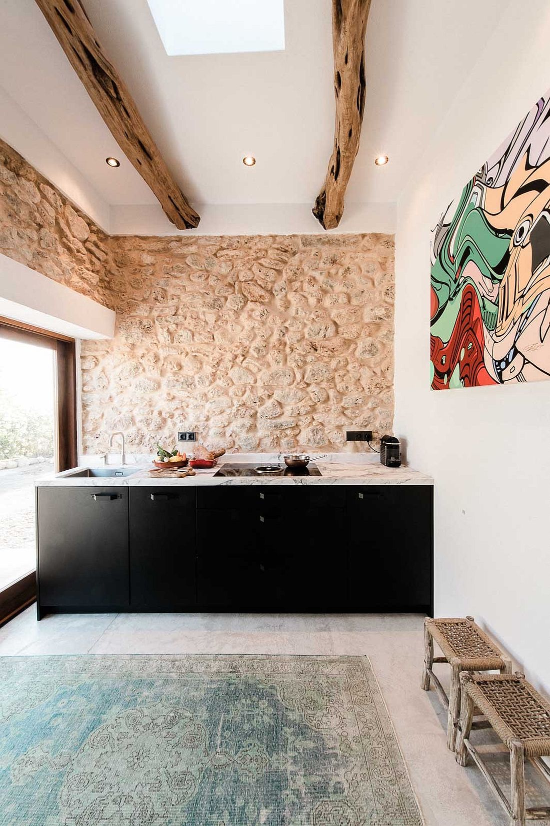 Steel designer kitchen with marble top from Eginstill inside the Ibiza home