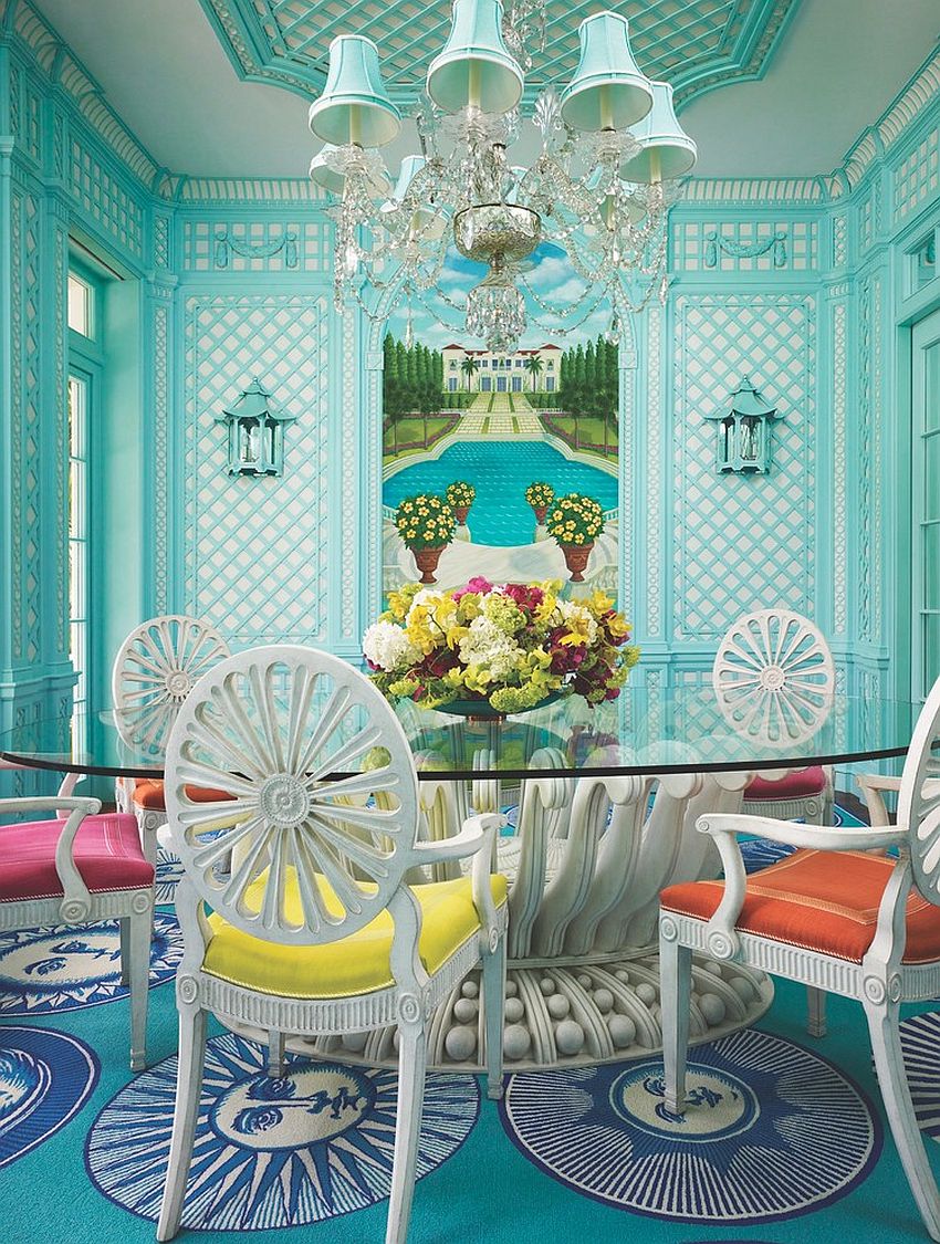 Stunning tropical dining room in turquoise with colorful chairs