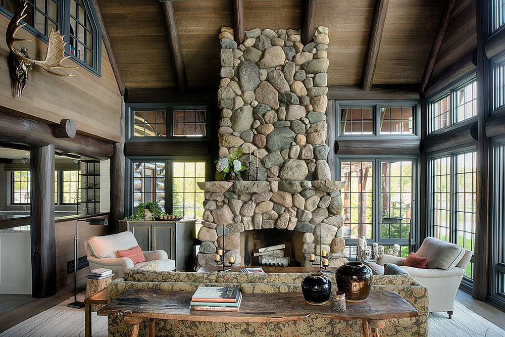 Stylish stone fireplace and live edge table for the spacious sunroom