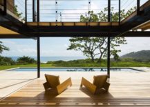Sweeping-wooden-terrace-and-interior-opens-up-to-the-ocean-and-jungle-views-outside-217x155