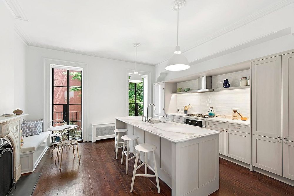 Tiny banquette in the kitchen corner is a smart space-saver [Design: Studio ai]