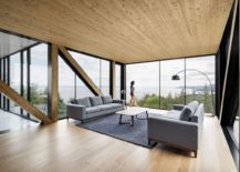 Top-level-living-area-with-glass-walls-and-a-breathtaking-view-217x155