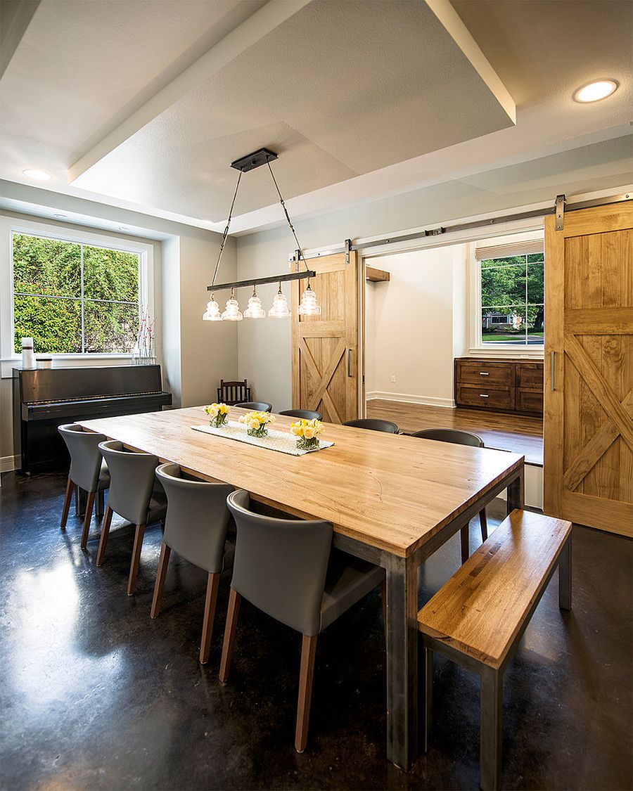 Traditional dining room with sliding barn door [Design: Mezger Homes]