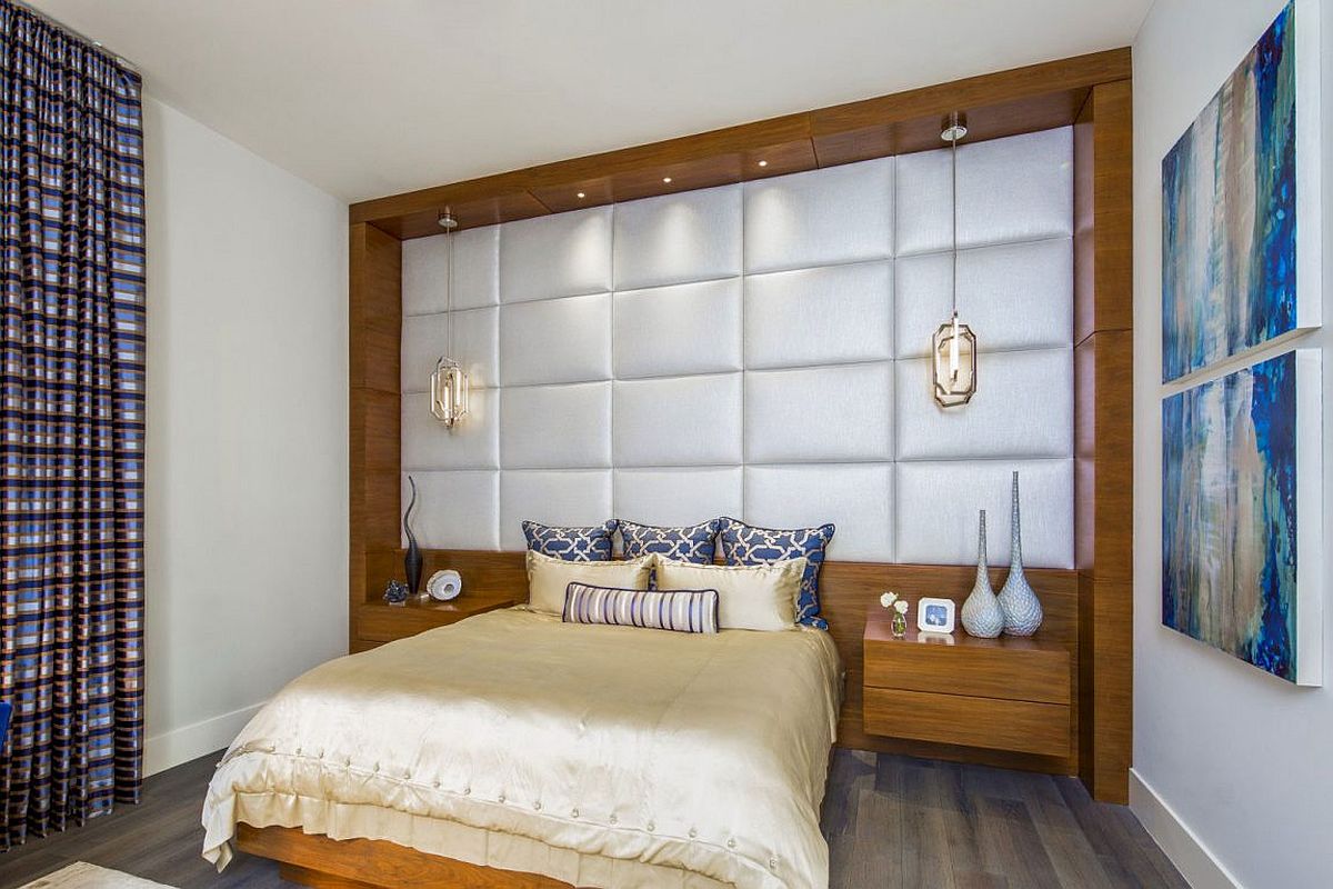 Tufted headboard wall brings opulence to the bedroom