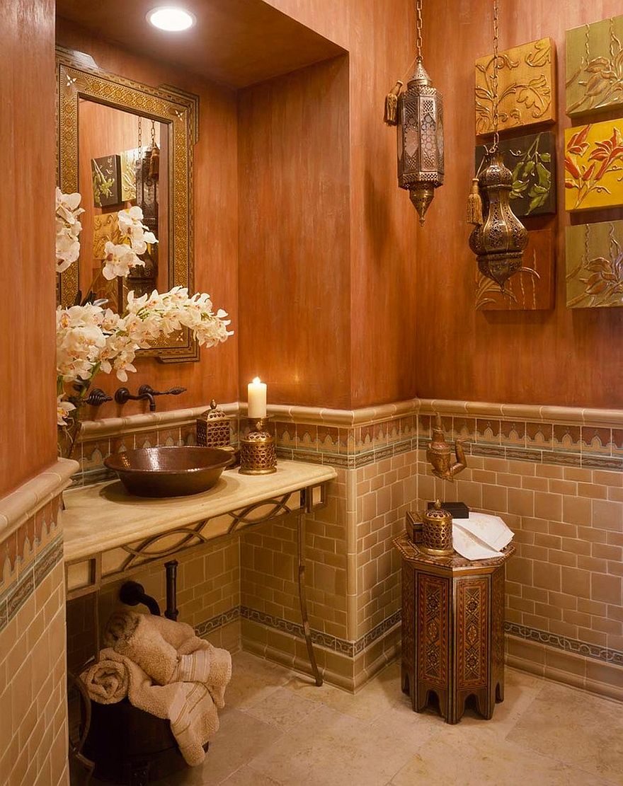 Unique decorative pieces on the wall, Moroccan style lighting and textured walls for the Mediterranean powder room