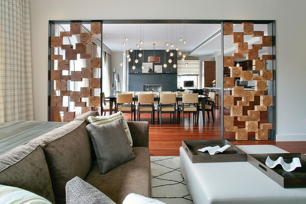 Unique room divider using wooden boxes separates the living and dining spaces [Design: Betty Wasserman]